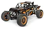HPI Baja Kraken TSK-B Class 1 RC buggy in black and orange, featuring a roll cage, off-road tires, and detailed body panels.