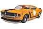 HPI Baja 5R 1970 Ford Mustang RC car in orange with black racing stripes and sponsor decals, shown from a front three-quarter angle.