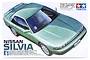 Tamiya 1/24 scale Nissan Silvia K's plastic model kit box art featuring a green Nissan Silvia car.