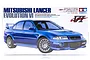 Tamiya 1/24 scale Mitsubishi Lancer Evolution VI plastic model kit box art featuring a blue car on a white background.