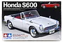 Tamiya 1/24 scale Honda S600 plastic model kit box art featuring a white convertible sports car on a black background.