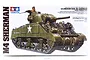 Tamiya 1/35 scale U.S. M4 Sherman Medium Tank model kit box art showing an olive drab tank with crew figures.