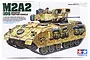 Box art for Tamiya 1/35 scale M2A2 ODS Infantry Fighting Vehicle model kit featuring a detailed illustration of a desert-tan Bradley tank.