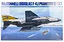 Tamiya 1/32 scale McDonnell Douglas F-4J Phantom II plastic model kit box art showing the jet flying over a naval fleet.