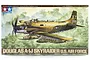 Tamiya 1/48 scale Douglas A-1J Skyraider model kit box art showing a camouflaged aircraft flying over a jungle.