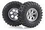 Two 1.9 inch RC crawler wheels with black off-road rubber tyres and grey six-spoke plastic rims.