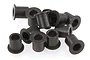 A pile of twelve small black flanged steering hub bushings for RC vehicles.