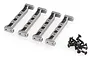 Four gunmetal grey aluminium RC chassis braces arranged in a row with a small pile of black screws to the right on a white background.