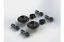 A set of black plastic ARRMA shock ends and spring retainers arranged on a white background.