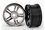 Two black chrome-finish split-spoke RC car rims standing on a white background.