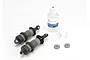 Two grey composite Traxxas GTR shock bodies, a bottle of silicone oil, and small plastic shock components on a white background.