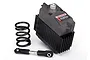 Traxxas 2085X waterproof digital metal gear servo with a black coil spring and a steering link assembly on a white background.