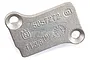 A cast metal cylinder transfer port cover for a Zenoah G320RC engine, featuring two mounting holes and embossed part numbers.