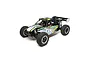 Losi DBXL-E 1/5 scale electric RC desert buggy in black, white, and yellow livery, shown from a high-angle studio shot.