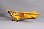 A bright yellow FMS Piper J-3 Cub RC plane model sitting on a plain grey studio background.