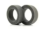 Two grey foam tyre inserts for RC buggy wheels arranged side-by-side on a white background.