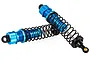 Two blue anodized aluminium RC shock absorbers with black springs, shown against a white background.