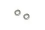 Two small silver metal shielded ball bearings for RC cars, shown on a plain white background.