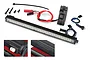 Traxxas TRX-4 Rigid LED light bar kit including the main light bar, power supply module, wiring harnesses, screws, and a zip tie.