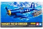 Tamiya 1/32 scale Vought F4U-1D Corsair plastic model kit box art showing a blue fighter plane flying over a tropical island.