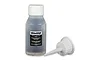 A bottle of Traxxas 30wt silicone shock oil with a white cap and a separate applicator nozzle cap resting beside it.