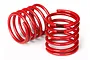 Two red Traxxas RC shock springs with a black stripe marking, positioned on a white background.