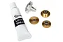 Traxxas metal servo gear set including three brass gears, one silver metal gear, and a tube of lithium grease on a white background.