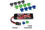 Traxxas battery charge indicator plugs in black, green, and blue, shown with a Traxxas 3-cell LiPo battery and labels for charge status.
