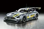 A studio shot of a Tamiya 1/24 scale Mercedes-Benz AMG GT3 model car, featuring a grey metallic finish with yellow racing stripes and AMG branding.