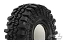 A close-up studio shot of a black Pro-Line 2.2 inch Interco TSL Super Swamper rock crawler tyre with aggressive tread pattern.