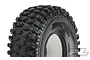 A close-up studio shot of a Pro-Line Hyrax 2.2 inch rock crawler tyre featuring an aggressive tread pattern and embossed sidewall branding.