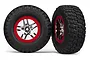 Two Traxxas 2.2/3.0 inch BFGoodrich Mud-Terrain T/A KM2 tyres pre-glued onto chrome and red beadlock-style wheels.