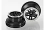 Two Traxxas 2.2/3.0 inch split spoke RC short course wheels with black centers and satin chrome beadlock-style rings.