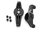 Traxxas TRX-4 portal drive caster blocks and small bushings on a white background.