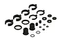 A set of black ARRMA RC shock spare parts including spring retainers, spacers, and O-rings on a white background.