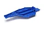 A blue Traxxas Slash Low CG chassis spare part shown from an elevated angle against a white background.