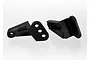 Two black plastic rear suspension link mounts for a Traxxas RC vehicle, shown against a white background.