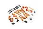 A collection of orange anodized aluminium RC car upgrade parts for HPI Sprint 2, including suspension arms, steering knuckles, and drive shafts.