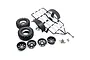 Yeah Racing 1/10 scale dirt bike trailer kit including a black metal frame, two off-road tires, four black wheels, and various assembly hardware.