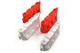 Four 1/10 scale road safety barriers in red and white plastic, arranged in a group on a white background.