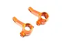 A pair of orange anodized aluminium front steering hubs for an HPI RS4 RC car, shown from a high angle against a white background.