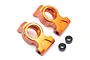 Two orange anodized aluminium rear hub carriers for HPI RS4 RC cars, with two small black spacers included.