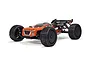 ARRMA Talion BLX 1/8 scale RC truggy in red and black, viewed from a front three-quarter angle against a white background.