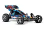 Traxxas Bandit 1/10 scale RC buggy with a blue, red, and yellow splatter paint scheme, chrome wheels, and a rear wing against a white background.