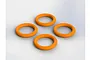 Four bright orange rubber O-rings arranged in a square formation on a plain white background.