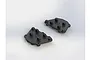 Two black ARRMA bump mounting plates for RC vehicles, shown from a high-angle perspective against a white background.