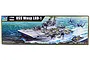 Trumpeter 1/350 scale USS Wasp LHD-1 model kit box showing an illustration of the aircraft carrier at sea with aircraft and a landing craft.