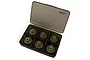 A set of six hard-coated aluminium pinion gears stored in a black plastic partitioned storage case.