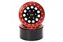 Two Yeah Racing 1.9 inch black aluminium crawler rims with red beadlock rings stacked on a white background.