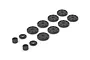 A set of black RC shock pistons and spacers arranged on a white background.